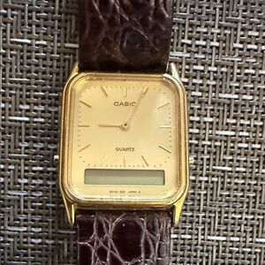 Casio Vintage Watch AQ-706 with Brown Strap. Needs battery.